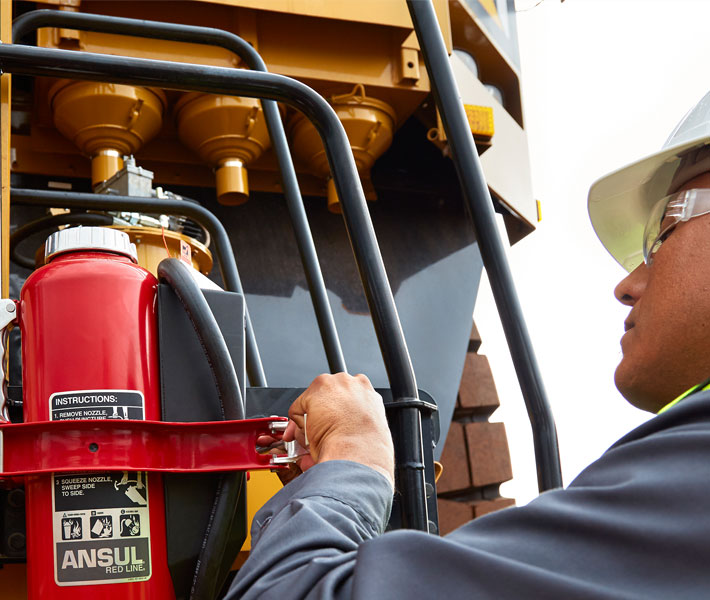 Construction worker and fire extinguisher